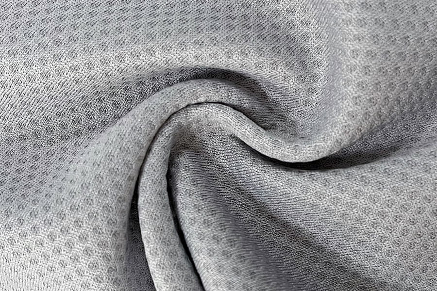 BCX-N0608: Vandabsorberende og kølig-følelse af monokrom Jacquard Mesh Honeycomb-stof